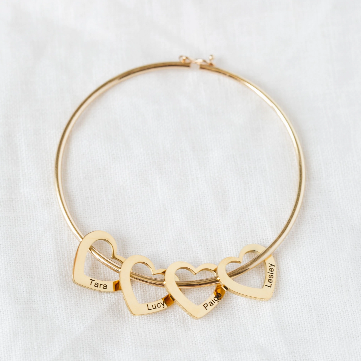 Bracelet with customizable heart pendants